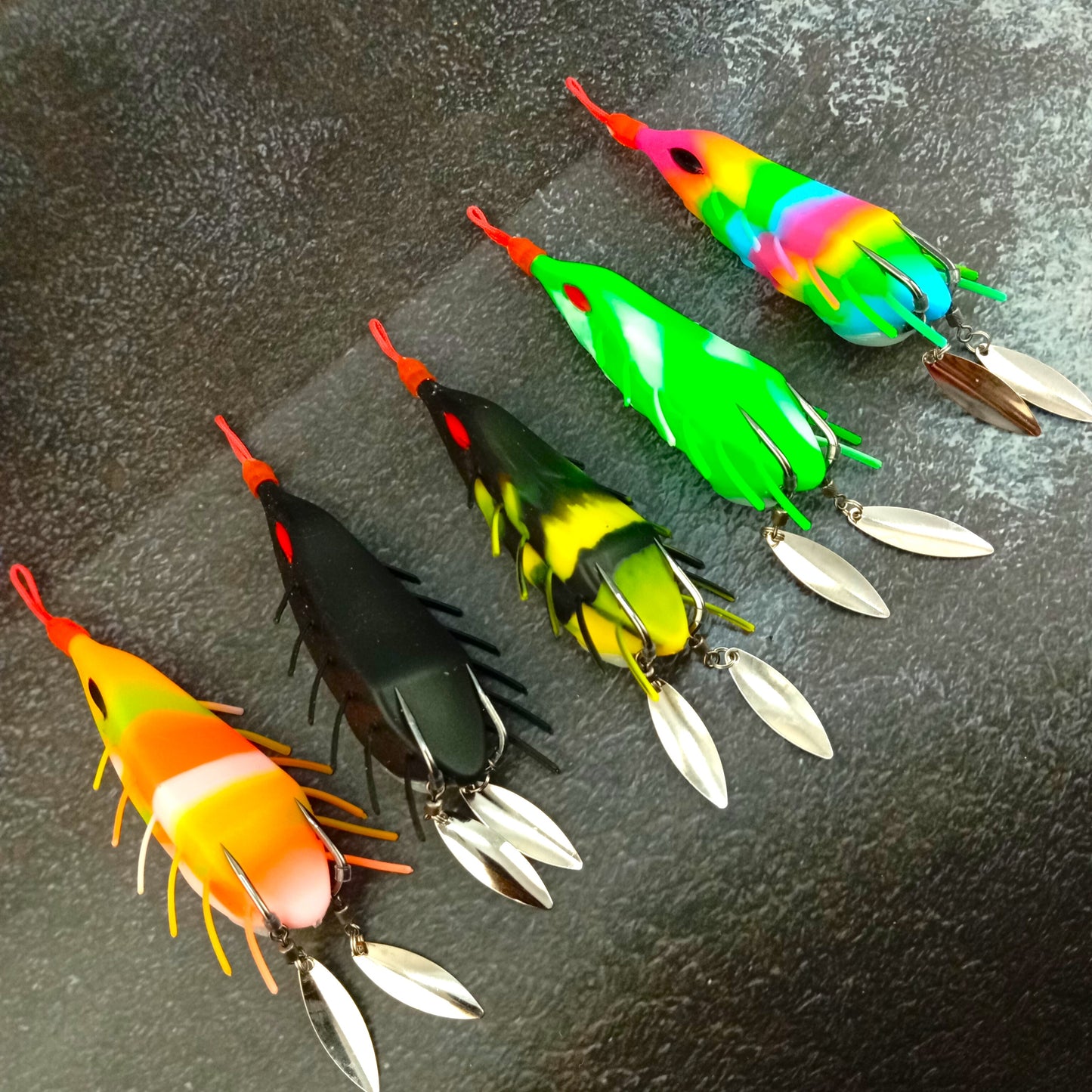 Long Costing Spinner Frog Lure 26gms-90mm Black Yellow Close Close Up Image