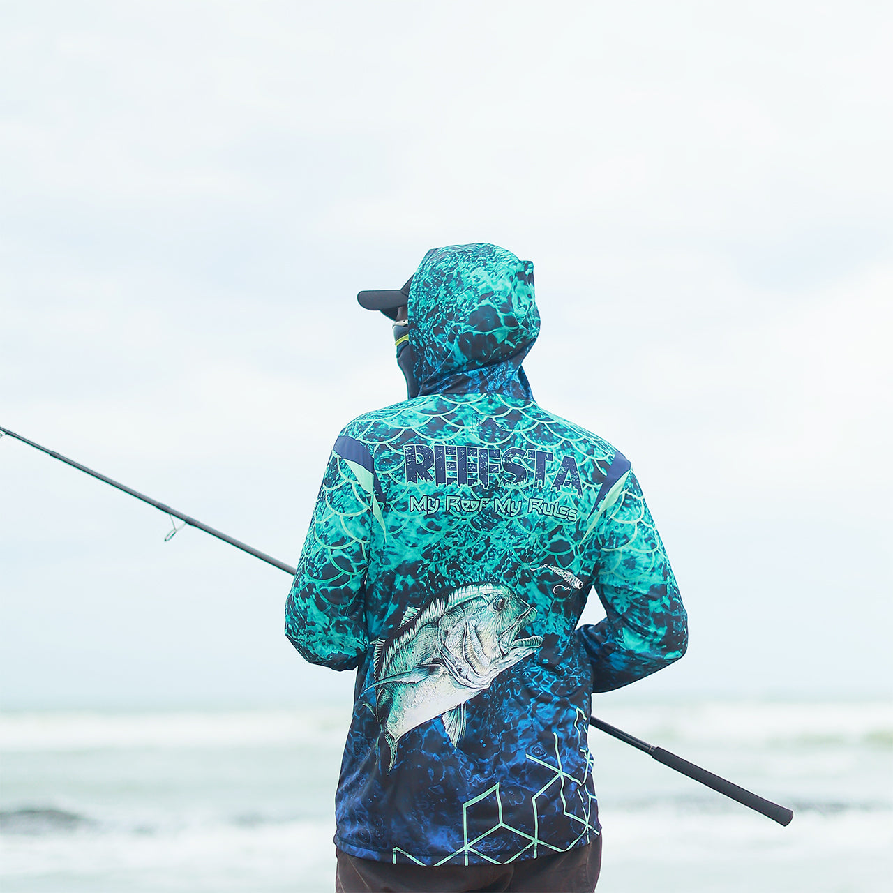 Eyida Reefsta UPF_50_ Hooded Performance Fishing T-Shirt Hanish Standing Back Side View Pose