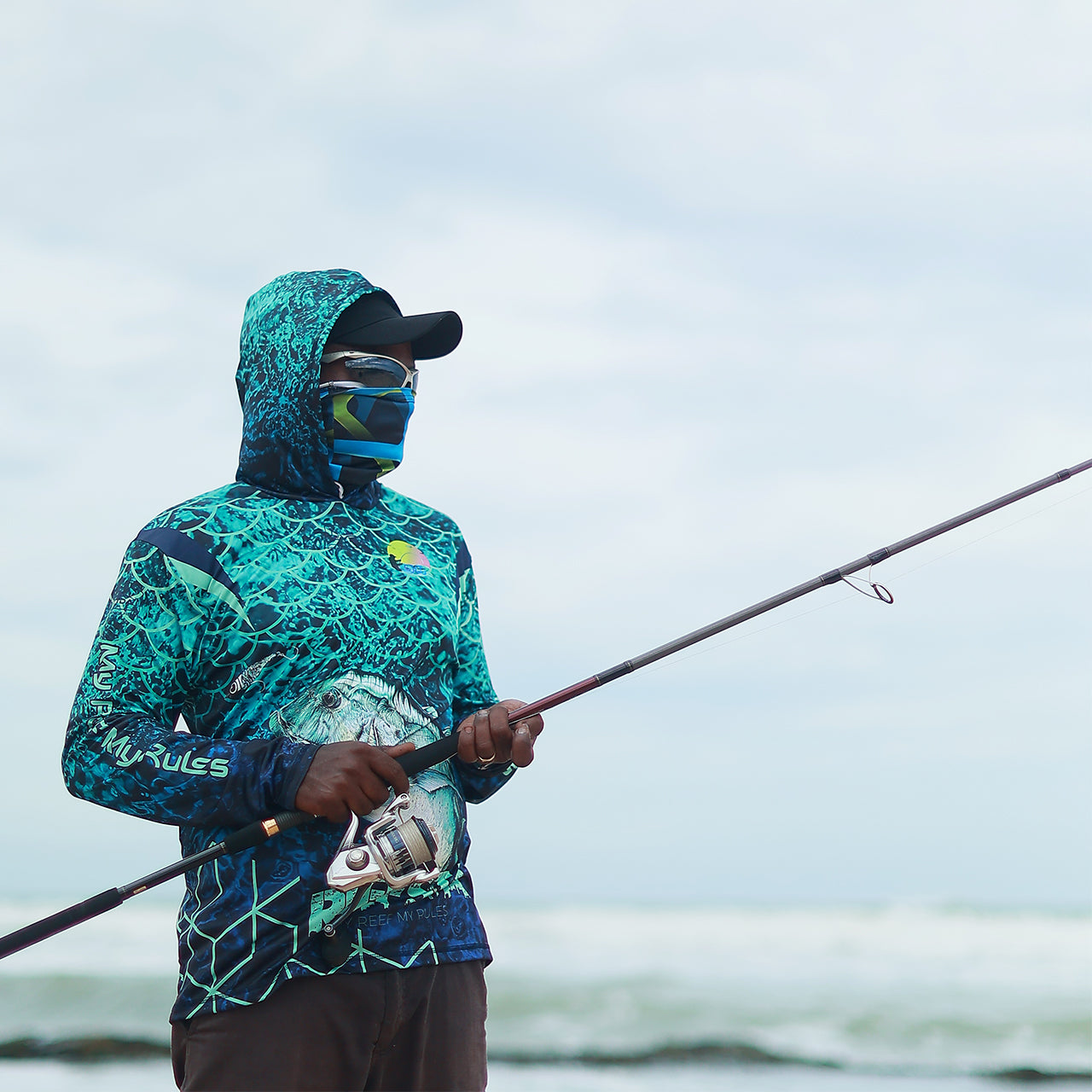 Eyida Reefsta UPF_50_ Hooded Performance Fishing T-Shirt Hanish Standing Side Pose