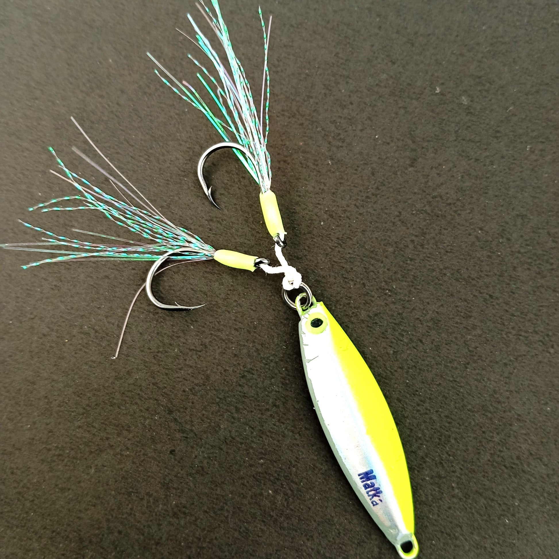 Matka Hand Made Jigs With Dual Glowing Assist Hooks Glowing Eye Design 20gms all Green Glow Color Close  Image